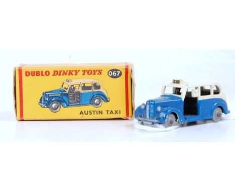 A 00 Dinky Toys No. 067 Austin Taxi finished in cream and blue with grey plastic wheels (VG,BVG)