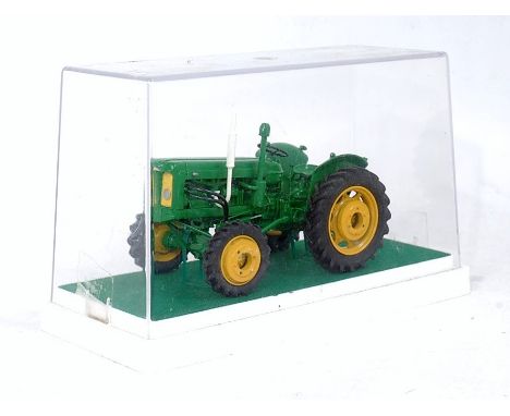 A possibly D Godburn Models 1/32 white metal model of a John Deere tractor, finished in green and yellow, in the original pla