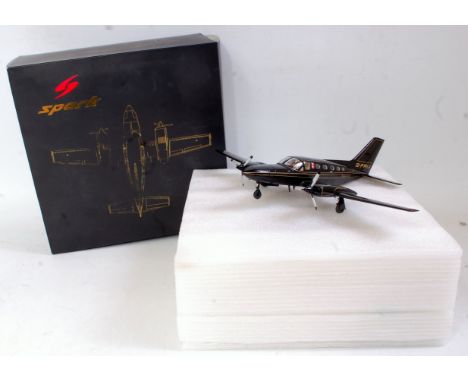 A Spark Models by Minimax 1/43 scale resin model of a Lotus aeroplane, model No. S0270, in original gold and black all-card b