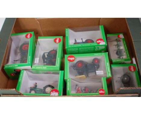 Eight various boxed Siku 1/32 scale tractor and farming implement diecast, comprising reference numbers; 3462, 3465, 3460, 34