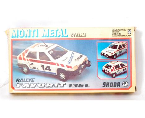 Kovozavody of Czech, 1/48th scale plastic and diecast kits for a Rallye Favorit 136L Skoda, in the all card box, as issued