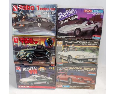 AMT/ERTL 1.25 scale Ford Movie kits, 6107 “Dick Tracy”1936 Ford Coupe@1990, 6059 “Robo 1” Taurus SHO Po lice @1990, 6417 “Res