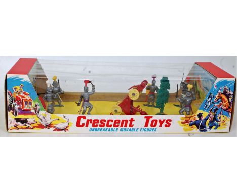 A Crescent Toys No. 3007  Medieval Knights and Catapult set, appears as issued in the original window box with outer card sle