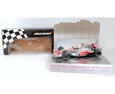 A Minichamps 1/18 scale limited edition release display model of a Lewis Hamilton 2008 F1 World Championship racing car MP4-2