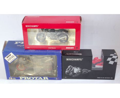 A Minichamps and Protar 1/12 and 1/9 scale boxed motorcycle group to include a Minichamps Yamaha YZR500, a Minichamps Ducati 