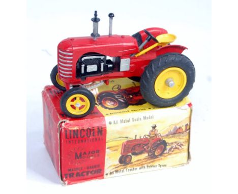 A Lincoln International diecast model of a Massey Harris tractor comprising red, black and silver body with yellow hubs and y