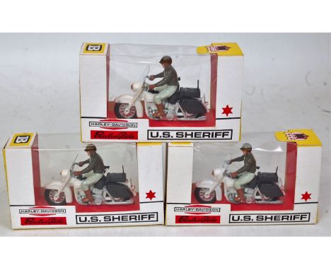 Three Britains 1/32 scale No.9692 US Sheriff Harley Davidson motorcycles, finished in white, silver and black, with drivers, 