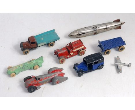 Collection of mixed diecast and tinplate items, to include Tinplate Zeppelin, Dinky Pre War Taxi and others Condition Report 