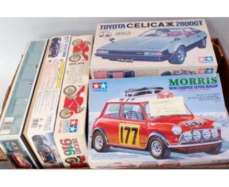 Nine various boxed mixed scale motorcycle and saloon plastic kits, to include Fujimi, Tamiya, Airfix etc, a Ducatti 916, a Sh