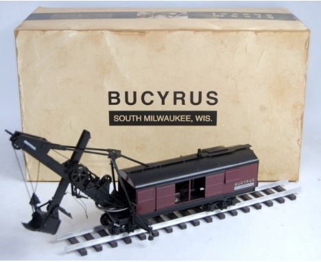 A TWH/Toy Trucker No. TWH021, 1/50 scale vintage series model of a Bucyrus steam shovel on railway track in the original poly