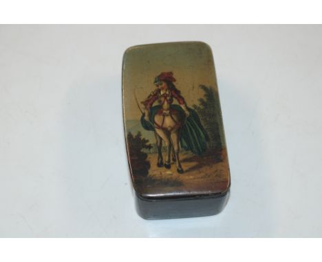 A Victorian Papier Mâché snuff box decorated naively with a lady on horseback