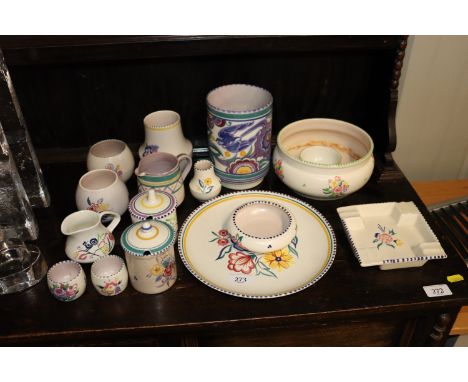 A large collection of Poole pottery to include a Carter Stabler Adams "Bluebird" pattern vase, various [preserve pots, cream 