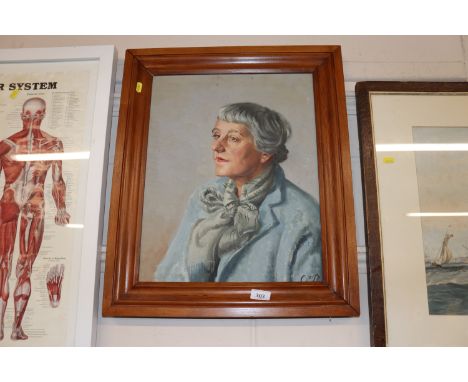 Oil on board, initialled C.C.P. seated portrait of a lady in pine frame