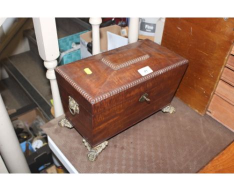 A 19th Century mahogany sarcophagus shaped two compartment tea caddy, mixing bowl AF
