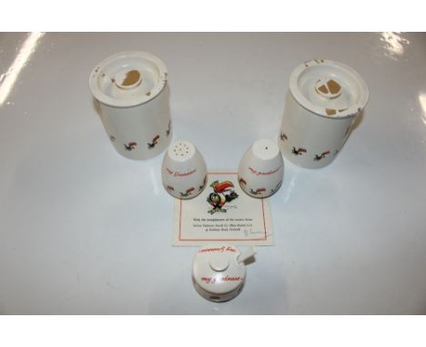 A pair of Carlton ware Guinness Toucan storage jars, matching salt and pepper pots and a Christmas Pudding recipe 