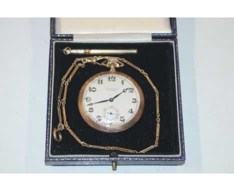 A J.W. Benson London 9ct gold cased pocket watch, engraved initials to the back, approx. 42gms; a 9ct gold elongated watch ch
