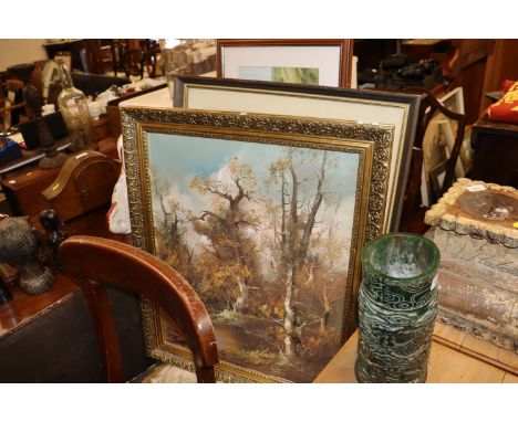 A framed coloured print after Peter Scott, "Ducks In Flight"; an oil on canvas, woodland river scene and another