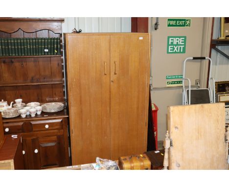 A G-plan light oak gentleman's wardrobe 