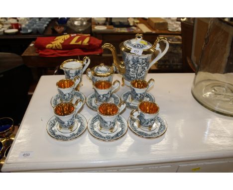 A Capo di Monte coffee set, comprising six cups and saucers, milk jug, sugar bowl and coffee pot