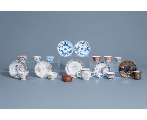 A collection of Chinese and Japanese cups and saucers and a Yixing stoneware teapot and cover, Kangxi and later -- Descriptio