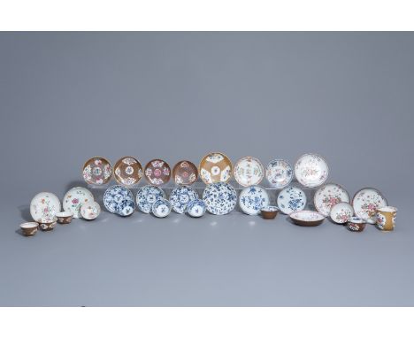 Nineteen Chinese blue, white and famille rose saucers and eleven cups with floral design, Kangxi and Qianlong -- Description: