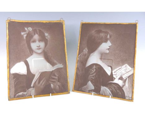 A pair of French Art Nouveau glass portrait panels, each painted in tones of brown, titled Liseuse and Venitienne, each signe