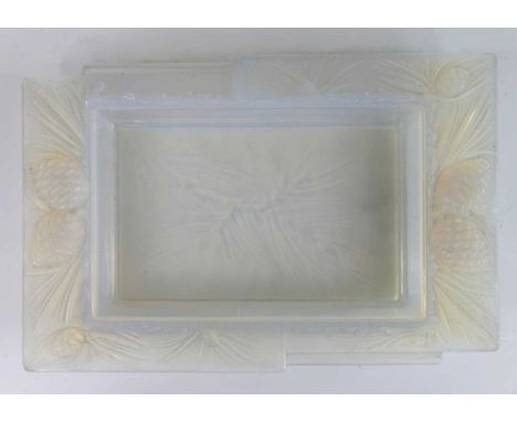 A French Art Deco moulded opalescent glass dish by Verlux, of rectangular form, the flattened border with opposing stepped de