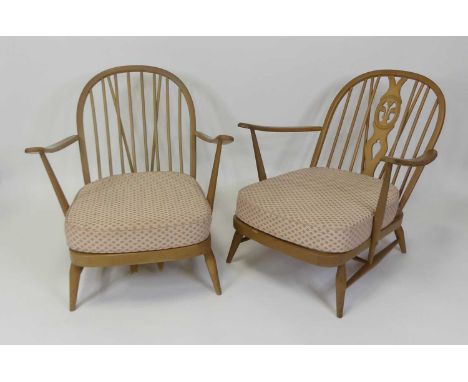 An Ercol blond elm stickback open armchair, with cushion back and seat, w.74cm (damaged to webbing of seat); together with a 