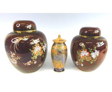 Two mid-20th century Carltonware ceramic New Bird of Paradise pattern ginger jars and covers, each enamel and gilt decorated,
