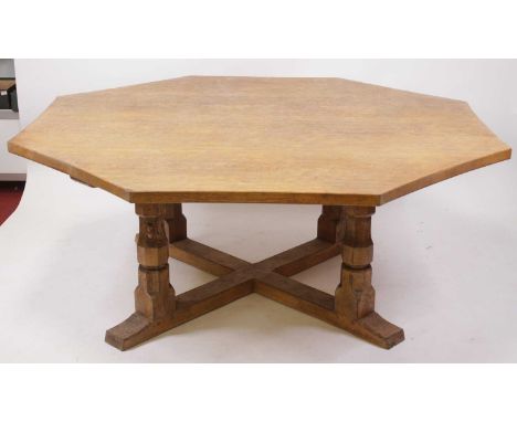 Robert 'Mouseman' Thompson - a large bespoke octagonal oak centre table, the top with adzed surface over X-base and raised on