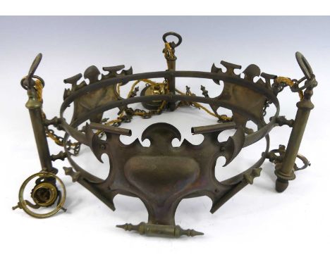 An Arts &amp; Crafts brass circular suspended three-branch ceiling light, with scroll pierced and shaped mounts, the chain li