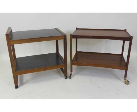 A 1960s teak and black formica inset two-tier tea trolley, with raised end handle, on roller castors, h.73.5cm, length 71.5cm