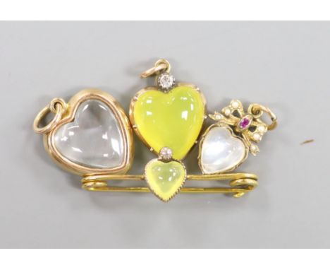   A yellow metal green chalcedony? and diamond set heart bar brooch, 34mm and three other heart shaped pendants including ena