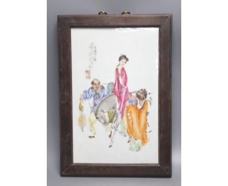   A Chinese framed poreclain plaque, painted with figures and script, height 44cm incl. frame