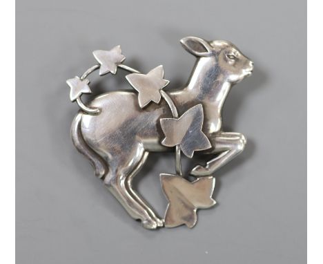 A Georg Jensen sterling lamp and frond brooch, no. 311, 47mm.
