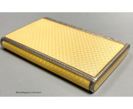   A 1920's continental silver and yellow guilloche enamel rectangular box and hinged cover, import marks for P.H. Vogel &amp;