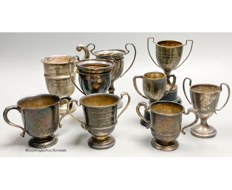   Eight assorted small silver trophy cups and one plated cup,  tallest 11.3cm, 11.5oz.