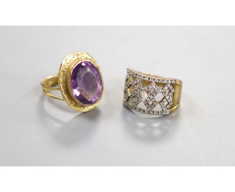   A modern pierced 9ct gold and diamond chip set dress ring, size P, gross 4.5 grams and a yellow metal and amethyst set oval