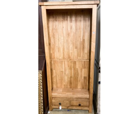   A contemporary light oak open bookcase, L.89cm D.27cm H.190cm