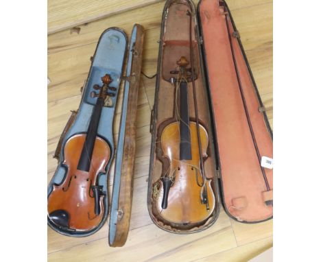   A Stradivarius copy violin and two bows and another bow, both cased, backs 33cm and 30cm