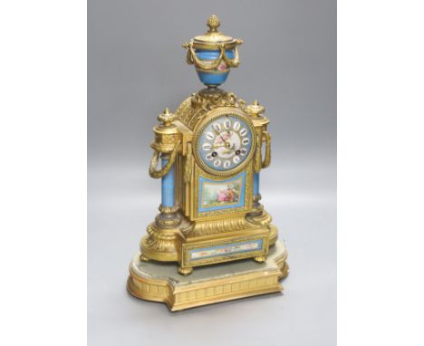   A late 19th century French gilt metal and porcelain mounted mantel clock, Japy freres movement countwheel striking on a bel