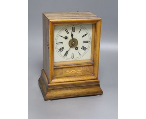   A 19th century walnut cased Black Forest mantel clock, bell striking movement with pendulum, height 24cm