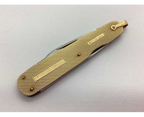 A Two Blade Folding Pocket Knife, (blades stamped "Made In Sheffield" and "Sheffield England", with 9ct gold engine turned sc