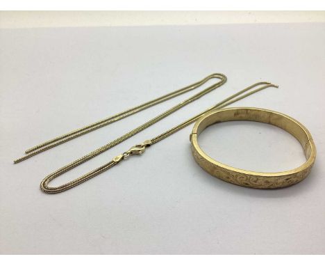 A Hollow Hinged Bangle, (dents) hinged to snap clasp stamped "375"; a modern QVC Veronese gilt chain (broken), stamped "Italy