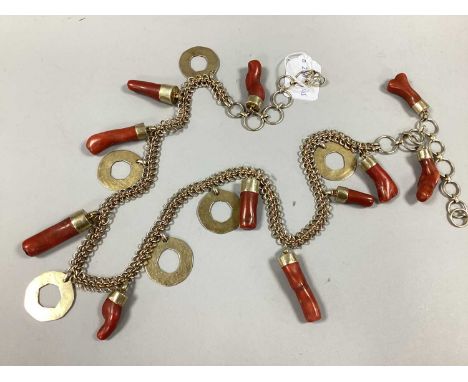 An Unusual Retro Style Gilt Metal and Coral Chain Link Belt, suspending open discs and coral pieces, overall length 102cm.