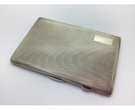 A Hallmarked Silver Cigarette Case, RJH, Birmingham 1946, rectangular form, allover engine turned, 12.8cm (180grams).
