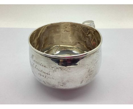 A Hallmarked Silver Cup, Messrs Hutton, Sheffield 1933, of squat circular form, engraved "Maurice Christmas 1942", rim approx