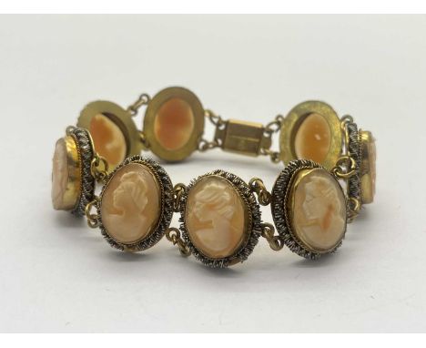 A Vintage Gilt Coloured BG Cameo Bracelet, of panel design, the carved portrait of a lady within ropetwist borders, to snap c