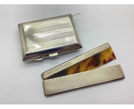 A Hallmarked Silver Mappin &amp; Webb Comb Case, complete with silver mounted comb, allover engine turned decoration; A Hallm