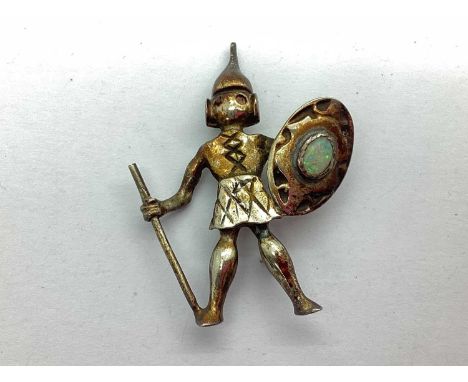 A Scandinavian Style Opal Inlaid Warrior Brooch, (axe not intact, one eye stone missing), stamped "SILVER".
